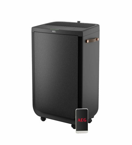Portable air conditioner AEG APU72571DG for home use, with vents and digital display visible in the image.