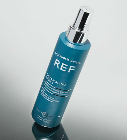 REF Detangling Conditioner bottle with label, 175 ml, for hair care and beauty, showcasing the product's packaging and design.