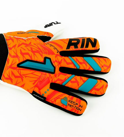 Orange Rinat Egotiko Vengador turf goalkeeper gloves for soccer, featuring padded palms and adjustable wrist straps.
