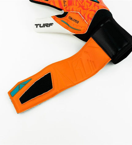 Rinat Egotiko Vengador Turf orange goalkeeper gloves for soccer, with padded palms and vibrant design.