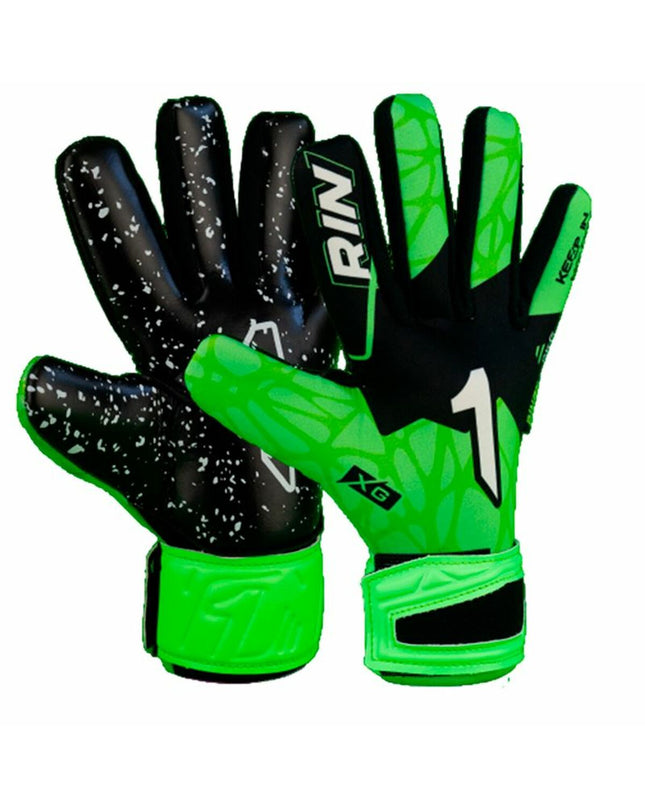 Rinat Keeperhandschoenen Rinat Xtreme Guard Dominius AS for soccer goalkeeping, black with padding and grip features.