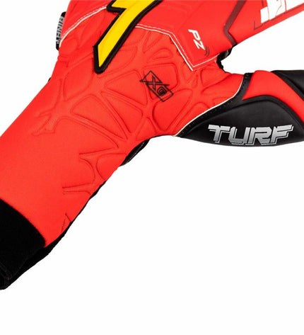 Red Rinat Keeperhandschoenen Xtreme Guard Dominius Turf for adults, designed for soccer goalkeeping and outdoor sports.