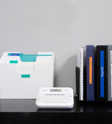Brother PT-D410UR1 label printer for office use with a compact design and easy-to-use control panel.