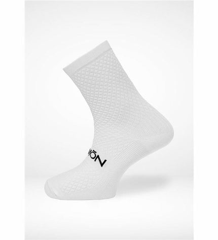White Hemon Fedaia sport socks designed for cycling and outdoor activities, featuring a comfortable fit and breathable fabric.