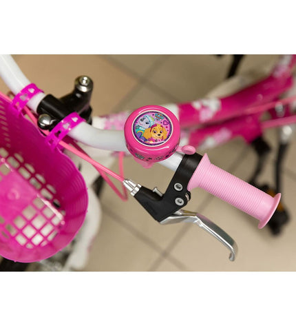 Pink Paw Patrol bicycle bell for kids' bikes, featuring colorful Paw Patrol characters, suitable for outdoor riding.