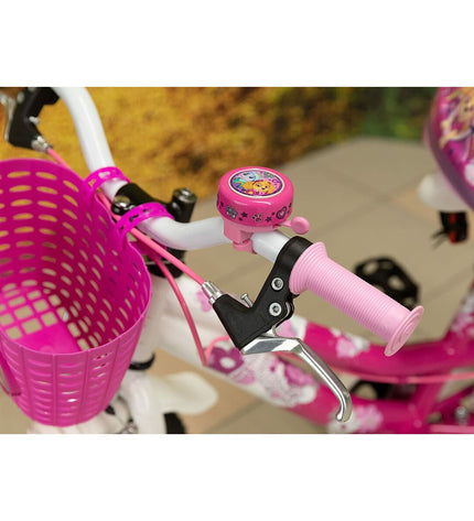 Pink Paw Patrol bike bell for kids, sporty outdoor accessory featuring colorful Paw Patrol characters, mounted on a bicycle handlebar.