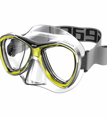 Seac yellow diving goggles for watersports and outdoor activities, with clear lenses and adjustable straps.