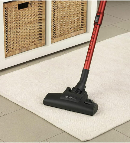 Ariete 2761 600W vacuum cleaner and handheld vacuum for home cleaning, displayed on a clean floor.