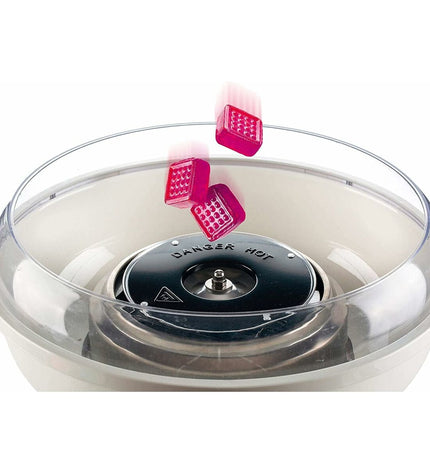 Ariete Suikerspinmachine ARI-2973-RD for making cotton candy, compact electric dessert maker with red accents, on a kitchen countertop.