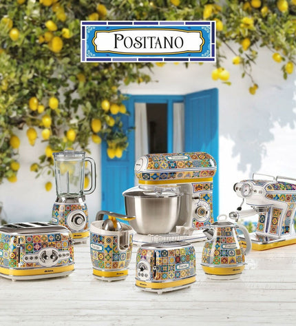 Ariete Positano yellow 1000W mixer with 1.5L capacity, showing the compact kitchen appliance with blending attachments.