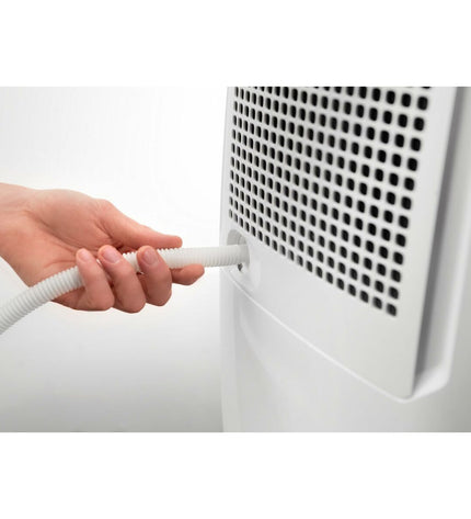 DeLonghi DEX210SF white portable air conditioner for home and kitchen use, compact and easy to move.