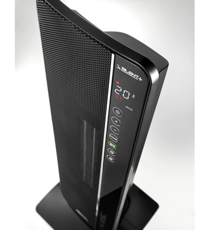DeLonghi TCH8993ER.BC black 2400W portable heater in a home setting, designed for heating and cooling.