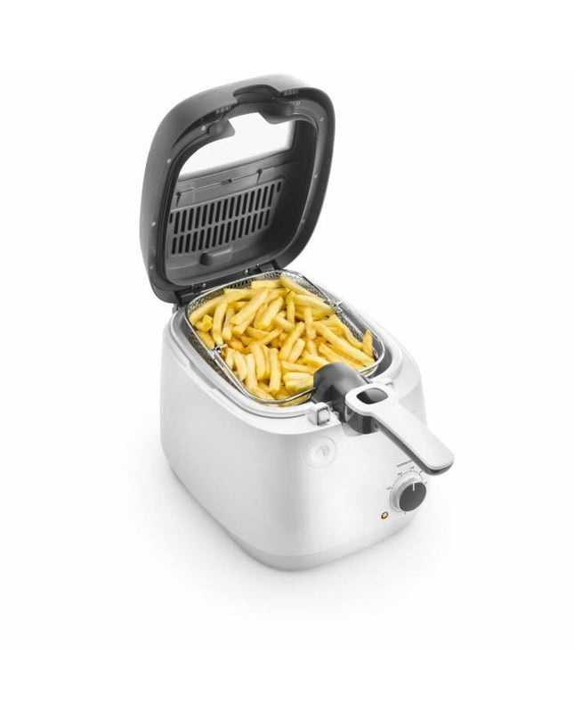 DeLonghi fry machine for home cooking, compact electric kitchen appliance with stainless steel finish and control dial.