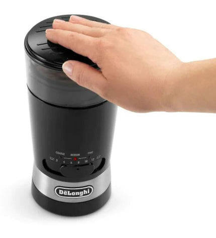DeLonghi KG210 zwarte elektrische koffie- en theegrinder met roestvrijstalen maalschijf en compacte design voor huisgebruik