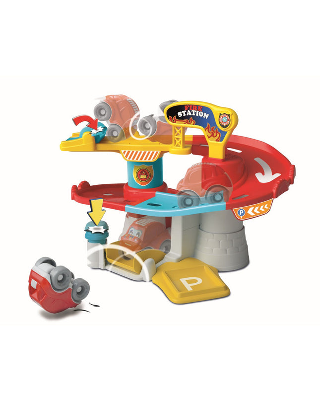 Clementoni race track toy with colorful vehicles on a play table, part of Clementoni's toy and game vehicle collection.