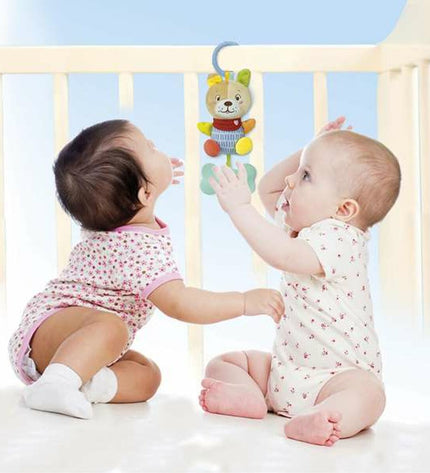 Clementoni Lovely Dog soft rattles toy for babies, 18x25x6 cm, colorful plush dog with rattling sounds, suitable for young children.