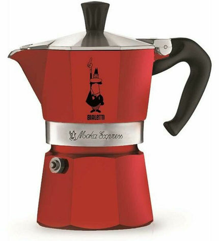 Red aluminium Bialetti Italian coffee pot with three cups for making espresso, suitable for home and kitchen use.
