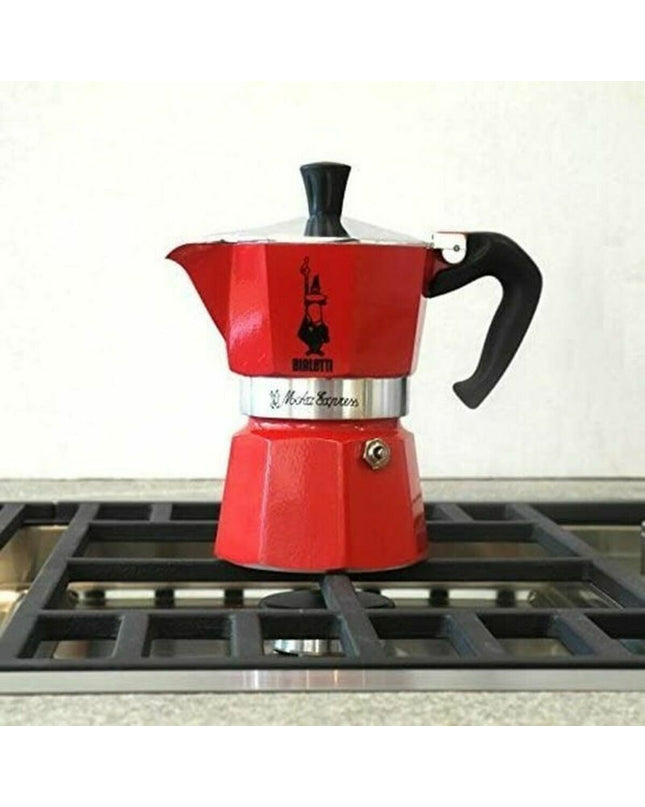 Red Bialetti Italian coffee pot with 3 cups, made of aluminum, designed for brewing traditional espresso on the stove.