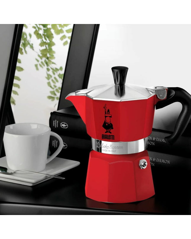 Red Bialetti Italian coffee pot with 6 cups, stovetop moka maker for rich espresso-style coffee, ideal for home brewing.