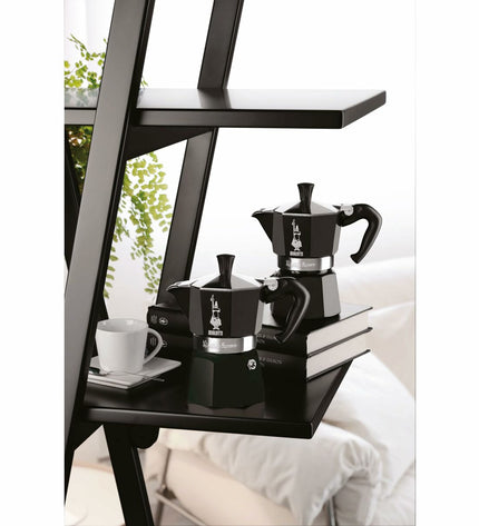 Black Bialetti Moka Express Italian coffee pot for stovetop brewing, ideal for making rich espresso-style coffee at home.