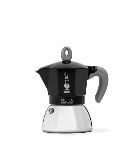 Black Bialetti Italian coffee pot made of aluminum, designed for brewing espresso on the stove.