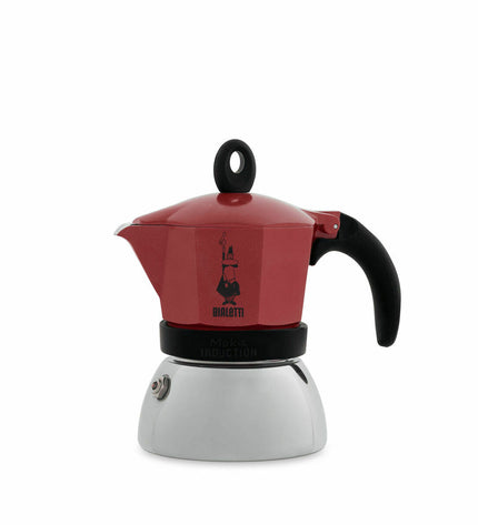 Red Bialetti Italian coffee pot made of aluminum metal, 150 ml, used for brewing espresso-style coffee at home.