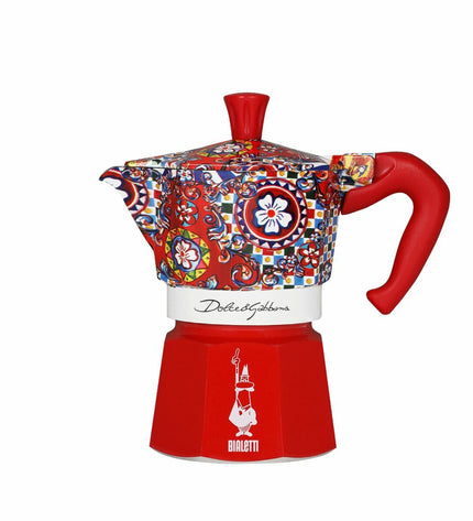 Bialetti Moka Express D&G 3-tcup Italian coffee pot for stove, made of aluminum with black handle and lid.