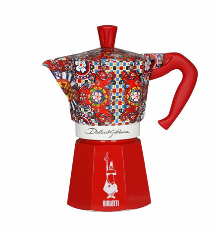 Bialetti Moka Express D&G 6-cup Italian coffee pot in red and silver aluminum, designed for brewing espresso.