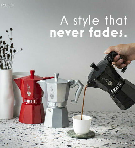 Red Bialetti Moka Express Italian coffee pot in aluminum with 6 cups, perfect for brewing authentic espresso at home.