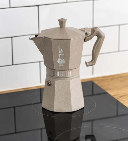 Bialetti EXCLUSIVE Italian coffee pot with three cups, stovetop moka maker for rich espresso-style coffee.