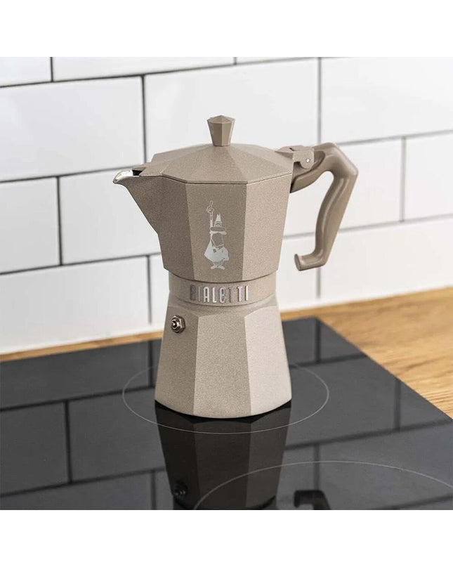 Bialetti EXCLUSIVE Italian coffee pot with three cups, stovetop moka maker for rich espresso-style coffee.