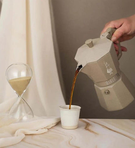 Bialetti EXCLUSIVE 3-cup Italian coffee pot for home brewing, made of stainless steel with a polished finish.