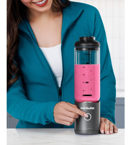 Nutribullet NBP013GM gray 600ml mixer cup for small kitchen appliances, showing the blending cup with lid and measurement markings