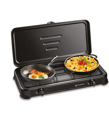 Kemper gasfornuis 57x30x6.5 cm for camping and outdoor cooking, with burners and control knobs visible.