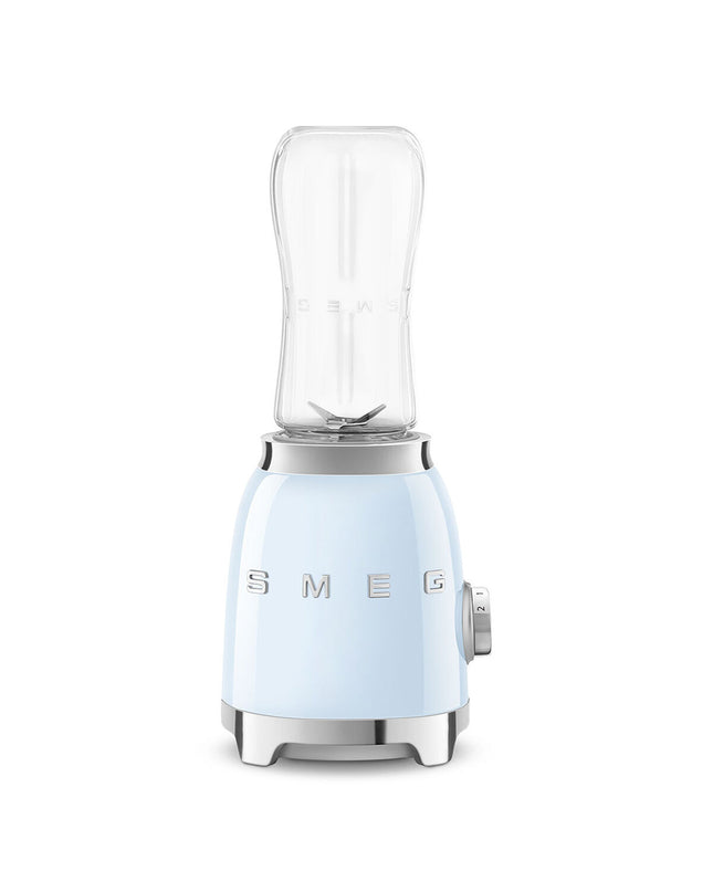 Smeg PBF01PBEU blue 300W handheld mixer for home cooking, featuring a compact design with beaters and control buttons.
