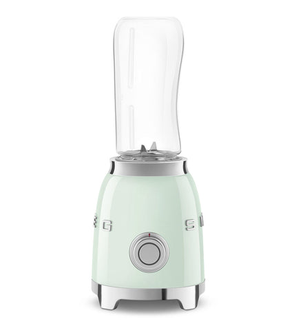 Smeg PBF01PGEU 300W white hand mixer with 600ml mixing bowl, compact electric kitchen appliance for baking and cooking.