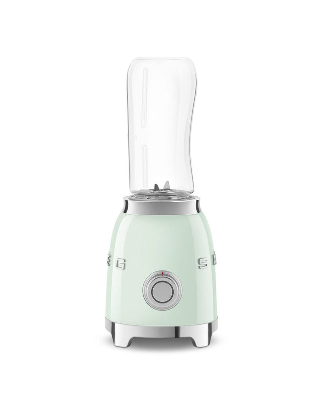 Smeg PBF01PGEU 300W white hand mixer with 600ml mixing bowl, compact electric kitchen appliance for baking and cooking.