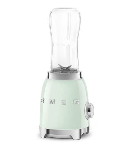 Smeg PBF01PGEU 300W white hand mixer with 600ml mixing bowl, compact electric kitchen appliance for baking and cooking.