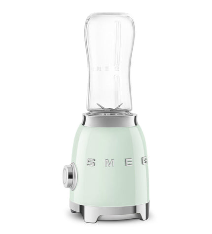 Smeg PBF01PGEU 300W white mini electric hand mixer with 600ml blending container for kitchen use.