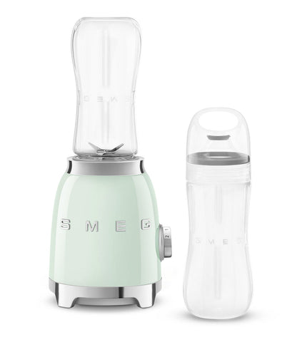 Smeg PBF01PGEU 300W white handheld electric mixer with 600ml beaker for kitchen and cooking tasks.