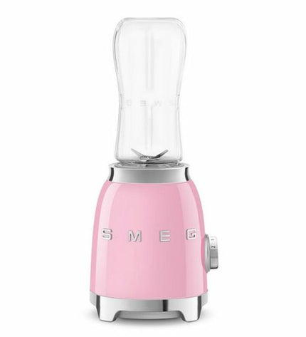 Smeg PBF01PKEU pink 300W compact hand mixer with 600ml mixing bowl for kitchen and home cooking.