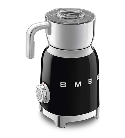 Smeg MFF11BLEU milk frother in black, compact electric kitchen appliance with 500W power for making creamy frothed milk.