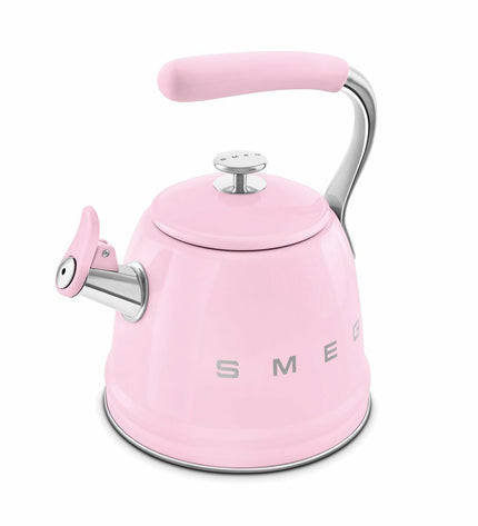 Smeg WKF01PK pink 2.3L teapot in kitchen setting, showcasing stylish design for tea and hot beverage preparation.