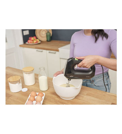 Braun HM2110BK black 500W blender and dough mixer on kitchen countertop, compact small electric kitchen appliance.