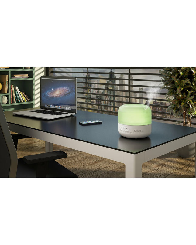 Olimpia Splendid Astomi Sound 400 ml portable air humidifier for home and kitchen use, shown with water tank and controls.