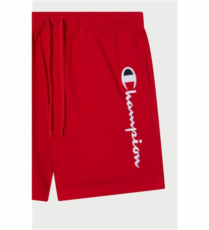 Champion men's red beach short, sporty watersport swimwear with elastic waistband, ideal for beach and outdoor activities.