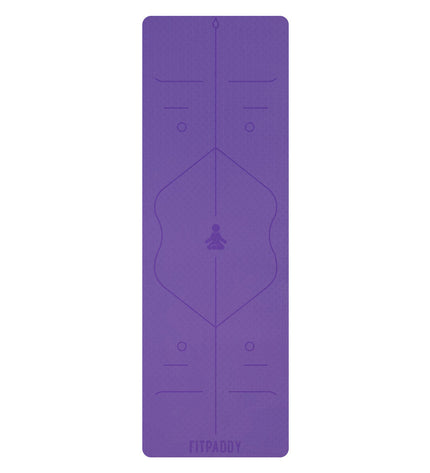 Purple Fitpaddy yoga mat for fitness and outdoor exercises, textured surface for stability and comfort during workouts.