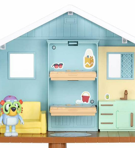 Bluey set of dolls and action figures from Bluey toy line, featuring colorful plush characters and play accessories.