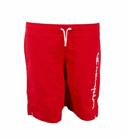 Red Champion kids' swimwear in a sporty design, suitable for outdoor watersports and beach activities.