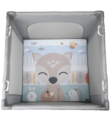 Chicco baby bedroom with a gray play area or furniture set, featuring soft bedding and cozy decor for a nursery.